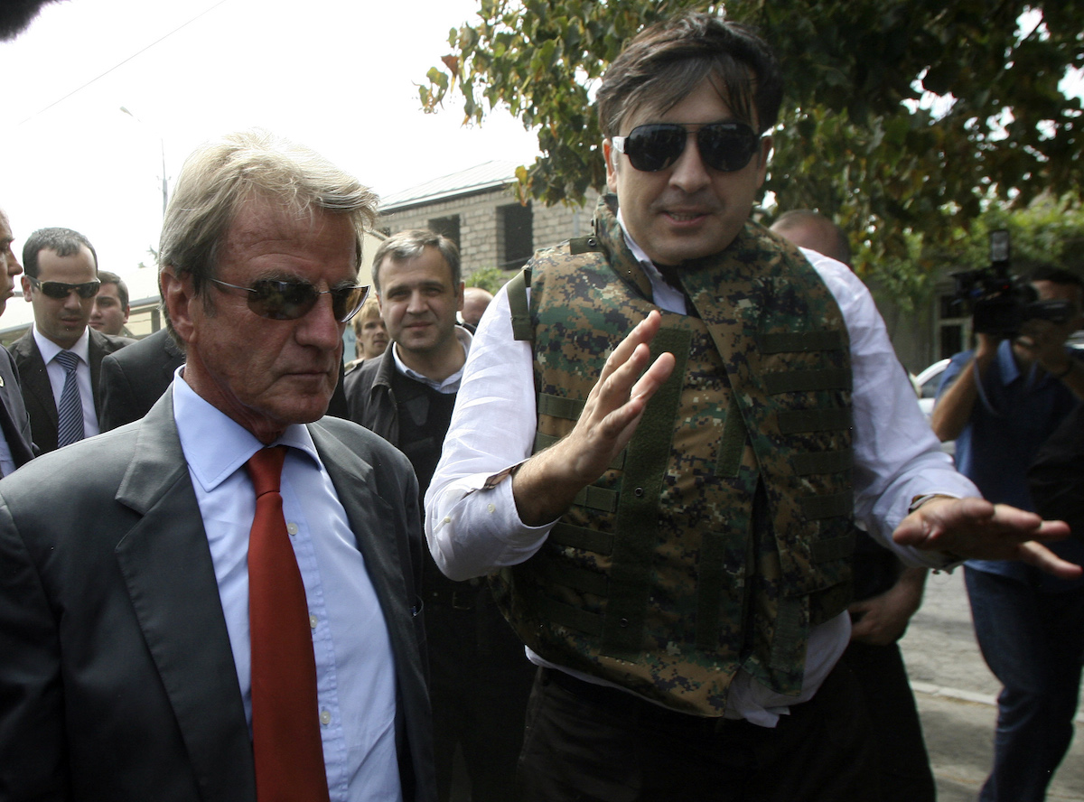 Saakashvili and French Foreign Minister Bernard Kouchner in Gori. August 2008. REUTERS