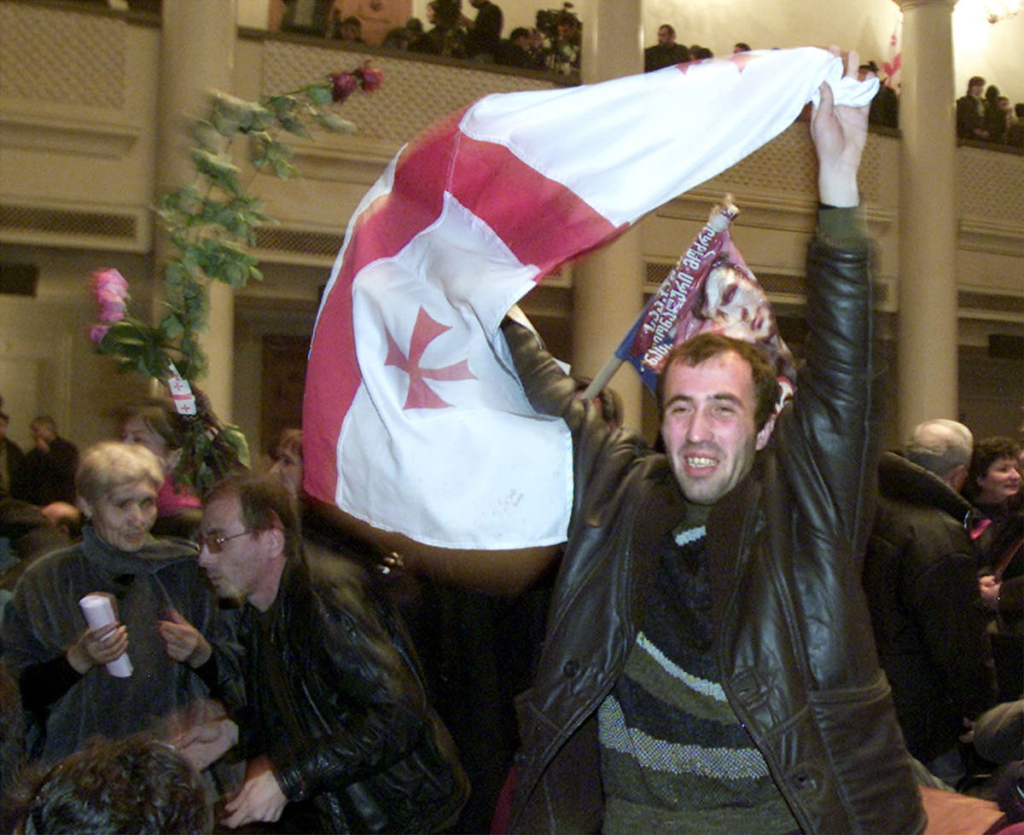 Saakashvili supporters in the session hall of parliament. 23 November 2003. REUTERS/David Mdzinarishvili