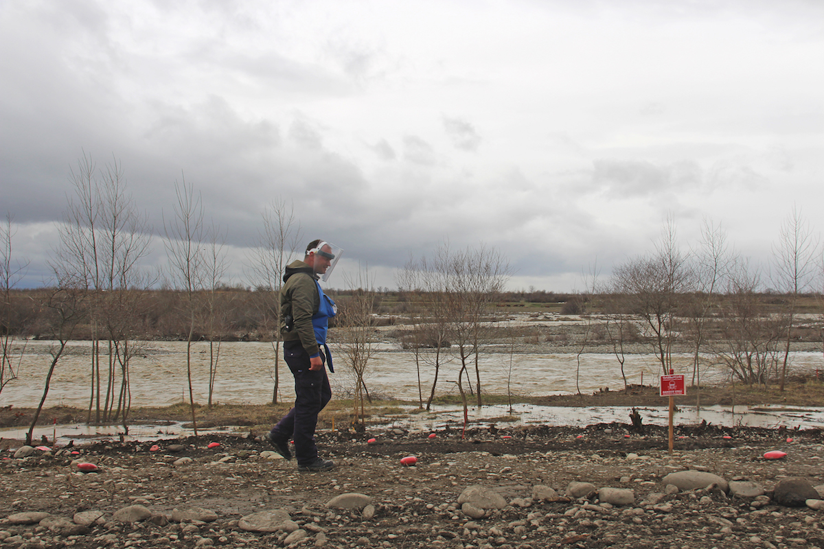 Halo Trust officers conducting mine clearance operations in the former 2008 war zone. Photo: David Pipia, JAMnews. Dzevera, Georgia.. Mine clearance, the August war in Georgia