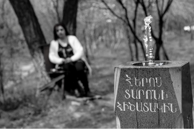 Fountain in honor of Taron in the courtyard of the church next to the house. 24-year-old Taron Givargizyan was killed in an Azerbaijani drone attack