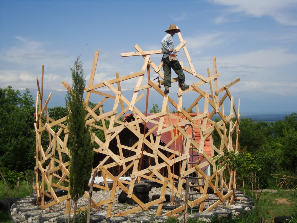 house made out of straw bales