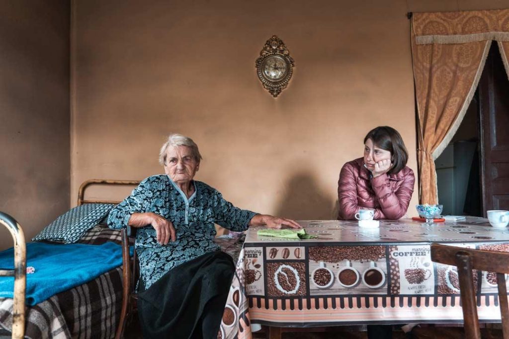 Caption: At her home in Khurvaleti, Nora, 80, talks with Crisis Group’s Senior Analyst for the South Caucasus Olesya Vartanyan. CRISIS GROUP/ Jorge Gutierrez Lucena
