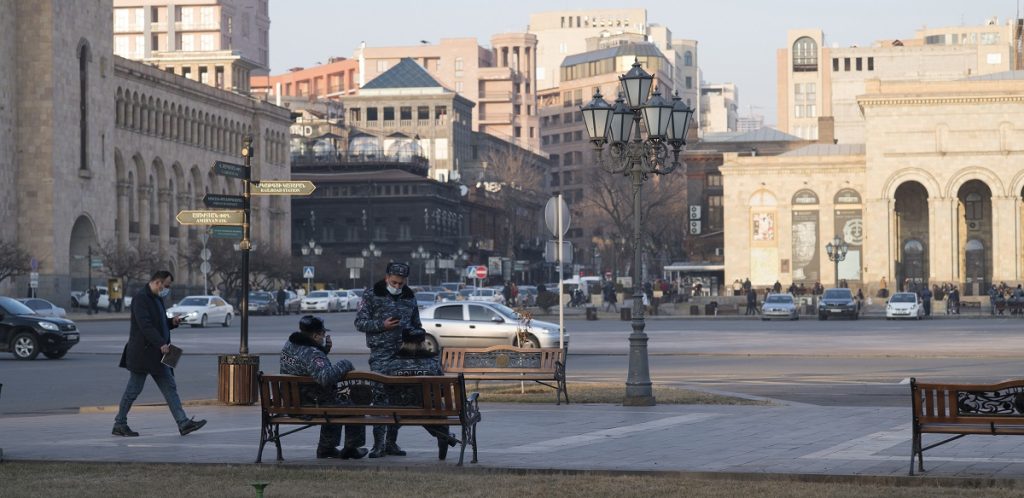 View from the main square of Yerevan on the new buildings that appeared next to the old buildings. Photo JAMnews