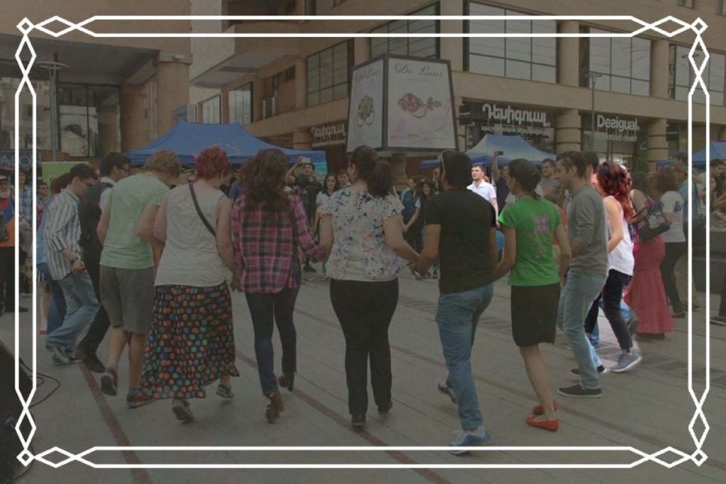 Dancing in the street with friends who came to celebrate the start of the couple's life together. Photo from the family archive