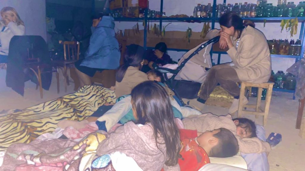 A photo of Karabakh journalist Siranush Sargsyan published in a social network with the caption: "After nine months of enduring hunger, we are now in a bomb shelter — sleeping with kids who yesterday dreamed of bread & today dream of waking up tomorrow."