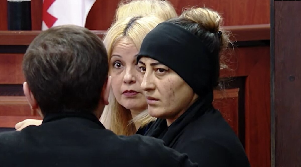 Aitaj Shakhmarova's mother at a court hearing. Photo: frame from the video "Mtavari archi"
