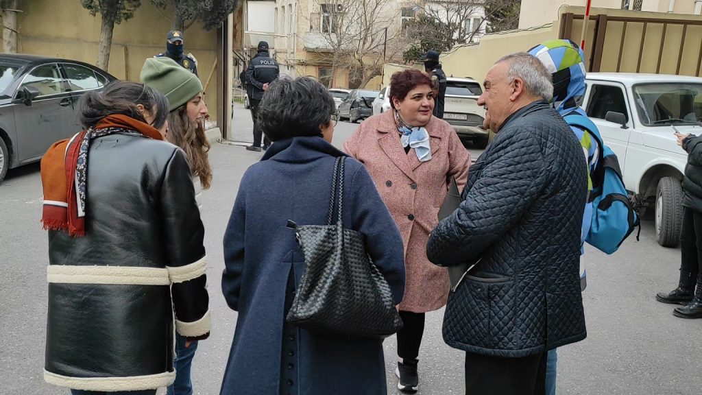 Khadija Ismayilova with her lawyer and colleagues in front of the Main Police Department of Baku City