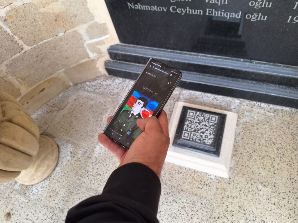 Zaur says they have been fulfilling orders from shehids' families free of charge  Graves with QR Codes in Azerbaijan