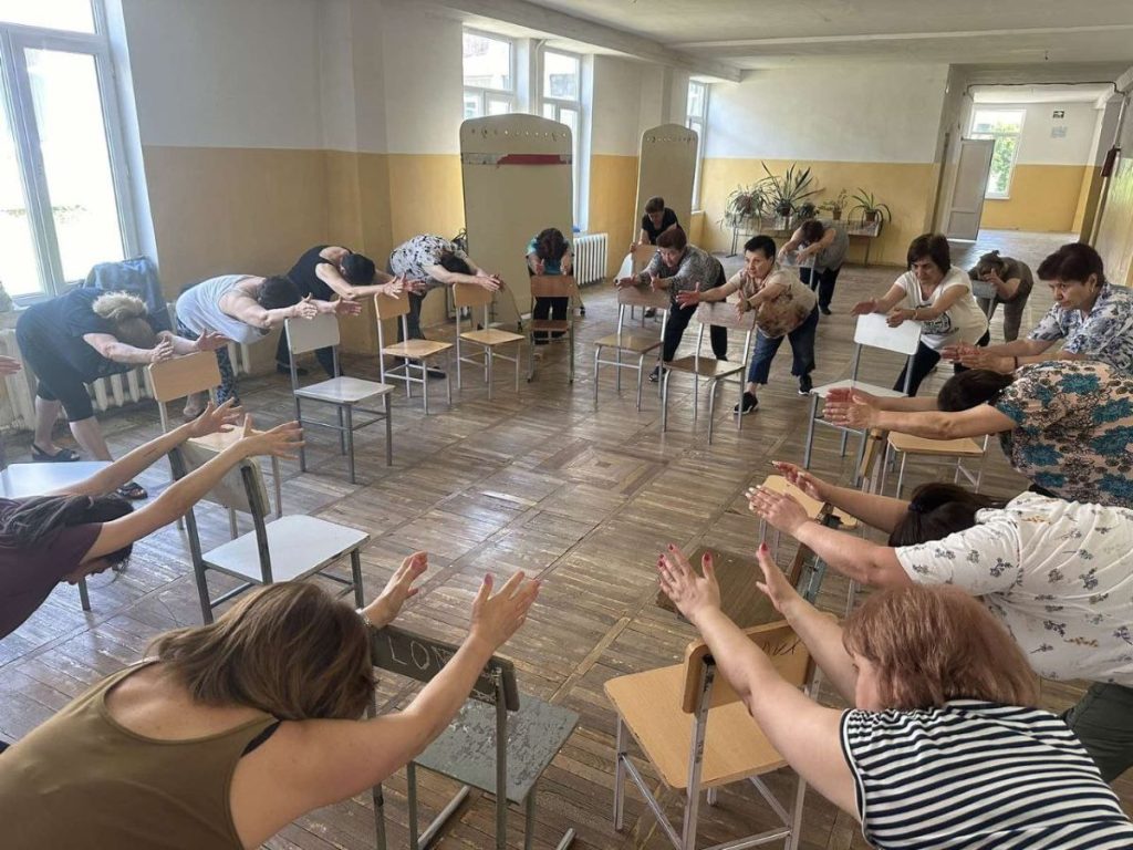 The exercises that group participants perform are considered by specialists to be easy but beneficial. Photo: JAMnews